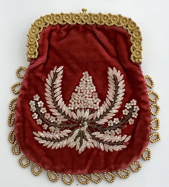 A true Victorian purse, given reputedly by Queen Victoria to William Sanders, housekeeper of the state apartments.1840’s English a rare fish scale on velvet