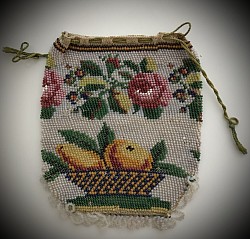 un framed Regency Era coin purse  9cm x 9.5 cm bead knitted in the round with no seams